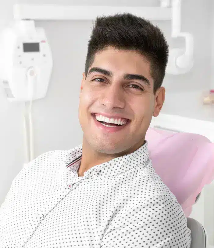 a happy male patient after seeing results from hair restoration 