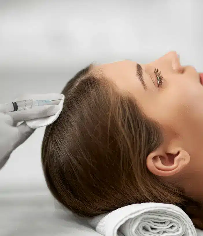 woman getting hair growth injections