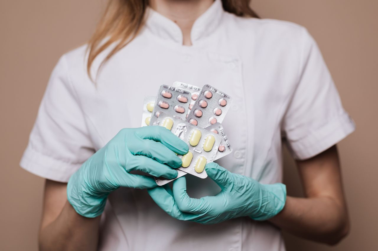 Doctor holding medicines